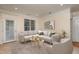 Comfortable living room featuring recessed lighting, neutral colors, and stylish, modern furniture at 1300 Durlain Dr # 108, Raleigh, NC 27614