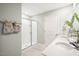 Modern bathroom with double vanity and a walk-in shower at 180 Paper Birch Way, Fuquay Varina, NC 27526