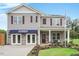 Two story home with stone and siding at 180 Paper Birch Way, Fuquay Varina, NC 27526