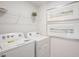 Bright laundry room with Whirlpool washer and dryer at 180 Paper Birch Way, Fuquay Varina, NC 27526