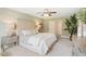 Main bedroom with king bed, ample natural light, and calming decor at 180 Paper Birch Way, Fuquay Varina, NC 27526