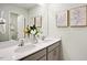 Double vanity bathroom with gray cabinets and quartz countertop at 197 Paper Birch Way, Fuquay Varina, NC 27526