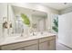 Modern bathroom featuring double sinks and stylish decor at 197 Paper Birch Way, Fuquay Varina, NC 27526