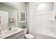 Clean bathroom with a bathtub, shower, and updated vanity at 197 Paper Birch Way, Fuquay Varina, NC 27526