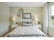 Bright bedroom with a comfortable bed and ample natural light at 197 Paper Birch Way, Fuquay Varina, NC 27526