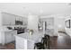 Modern kitchen with gray cabinets, granite countertops, and stainless steel appliances at 197 Paper Birch Way, Fuquay Varina, NC 27526