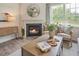 Cozy living room with fireplace and comfortable seating area at 197 Paper Birch Way, Fuquay Varina, NC 27526