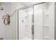 Clean shower with glass enclosure and built-in shelving at 197 Paper Birch Way, Fuquay Varina, NC 27526