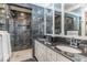 Elegant bathroom with black marble and double vanity at 2801 Chelsea Cir, Durham, NC 27707