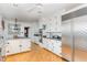 Kitchen with stainless steel appliances and white cabinets at 2801 Chelsea Cir, Durham, NC 27707