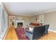 Bright living room with hardwood floors and fireplace at 2801 Chelsea Cir, Durham, NC 27707