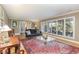 Living room with hardwood floors, large windows and view at 2801 Chelsea Cir, Durham, NC 27707