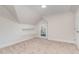 Cozy bedroom boasts a built-in shelving alcove and neutral carpeting at 3212 Potthast Ct, Raleigh, NC 27616