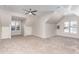 Spacious bonus room with dual windows, offering ample natural light and carpeted flooring at 3212 Potthast Ct, Raleigh, NC 27616