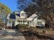 Charming home with a covered front porch and well-maintained landscaping at 3212 Potthast Ct, Raleigh, NC 27616