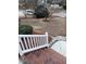 Inviting front yard featuring a well-maintained lawn, mature trees, and a charming walkway to the home at 3212 Potthast Ct, Raleigh, NC 27616