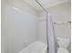 Standard tub/shower combination with tile surround, providing a practical and clean bathing space at 3347 Ridgecrest Ct, Raleigh, NC 27607