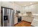 Well-equipped kitchen featuring stainless steel appliances and light-colored cabinetry at 3347 Ridgecrest Ct, Raleigh, NC 27607