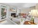 Cozy living room featuring fireplace and hardwood floors at 3347 Ridgecrest Ct, Raleigh, NC 27607