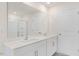 Clean bathroom with double vanity and a large mirror at 435 Blue Aspen Dr, Fuquay Varina, NC 27526