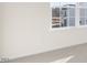 Bright bedroom featuring a large window and carpet at 435 Blue Aspen Dr, Fuquay Varina, NC 27526