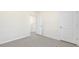 Simple bedroom with neutral walls and carpeted floors at 435 Blue Aspen Dr, Fuquay Varina, NC 27526