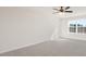 Bright bedroom featuring a large window and ceiling fan at 435 Blue Aspen Dr, Fuquay Varina, NC 27526
