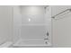 Bright bathroom showcasing a shower and tub with modern chrome fixtures at 50 Arbor Dr, Youngsville, NC 27596