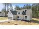 Charming single-Gathering home featuring a two-car garage and a meticulously maintained lawn with mature landscaping at 50 Arbor Dr, Youngsville, NC 27596