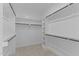 Spacious walk-in closet featuring shelving and racks for optimal storage solutions at 50 Arbor Dr, Youngsville, NC 27596