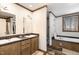 Double vanity bathroom with soaking tub and separate shower at 5724 Walters Ln, Burlington, NC 27217