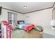 Charming bedroom with colorful bedding and toys at 5724 Walters Ln, Burlington, NC 27217
