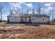 Ranch style home with gray siding and a landscaped yard at 5724 Walters Ln, Burlington, NC 27217