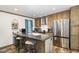 Modern kitchen with stainless steel appliances and an island at 5724 Walters Ln, Burlington, NC 27217