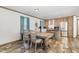 Kitchen with stainless steel appliances and a dining table at 5724 Walters Ln, Burlington, NC 27217