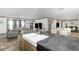 Open concept kitchen and living area with white farmhouse sink at 5724 Walters Ln, Burlington, NC 27217
