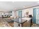 Open concept kitchen and living area with wood-look floors at 5724 Walters Ln, Burlington, NC 27217