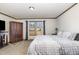 Large main bedroom with plush carpet and large windows at 5724 Walters Ln, Burlington, NC 27217