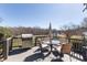 Spacious back deck with outdoor dining and BBQ area, ideal for entertaining at 7700 Circle L Trl, Rougemont, NC 27572
