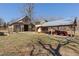 A quaint two-story barn with a covered area on the property at 7700 Circle L Trl, Rougemont, NC 27572