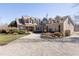 Long driveway leading to a stunning home with beautifully maintained landscaping at 7700 Circle L Trl, Rougemont, NC 27572