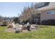 Outdoor fire pit surrounded by Adirondack chairs, perfect for relaxing at 7700 Circle L Trl, Rougemont, NC 27572