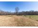 Expansive pasture with a barn and fencing, perfect for horses or livestock at 7700 Circle L Trl, Rougemont, NC 27572