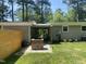 Brick firepit and patio with modern wood fence at 106 Williams St # 106 106 A 106 B, Carrboro, NC 27510