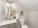 Small bathroom with an oval mirror and gray vanity at 107 Coatbridge Cir, Cary, NC 27511