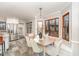 Breakfast nook with built-in bench seating and view of kitchen at 107 Coatbridge Cir, Cary, NC 27511