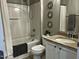 Clean bathroom with tub, shower, and granite countertop at 1211 Canyon Rock Ct # 111, Raleigh, NC 27610