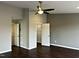 Main bedroom with ceiling fan and walk-in closet at 1211 Canyon Rock Ct # 111, Raleigh, NC 27610