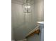 Elegant chandelier illuminates a carpeted staircase at 1211 Canyon Rock Ct # 111, Raleigh, NC 27610
