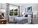 Serene bedroom with gray walls, unique curtains, and a cozy atmosphere at 127 Preston Trce, Pittsboro, NC 27312